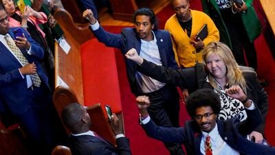 Gloria Johnson, Justin Jones and Justin Pearson react after listening to Vice President Kamal Harris's address in Nashville, Tennessee. Reuters