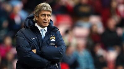 Manuel Pellegrini feels Manchester City are fast losing any chance of winning the Premier League title this season. Ian MacNicol / AFP