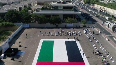 A UAE flag mosaic of almost 500 square meters has been added to the Guinness World Records. It was a result of a campaign to help families affected by the pandemic. Wam