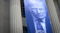 US President Donald Trump has made a habit of placing his image and name on federal buildings across Washington. Joshua Longmore / The National