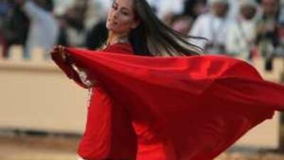 A dancer performs at the Al Ain Heritage Village during the National Day celebrations.
