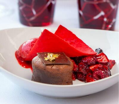 Semi-cooked bitter chocolate, red fruits coated with a coulis, strawberry sorbet at Fouquet's Abu Dhabi
