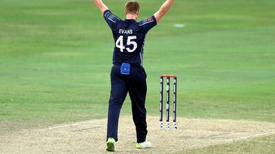 Scotland's Alasdair Evans takes the wicket of UAE batsman Junaid Siddique. Chris Whiteoak / The National
