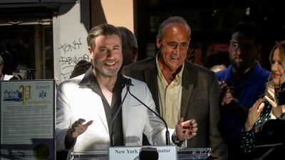 John Travolta speaks during an appearance outside Lenny's Pizza, which was featured in his movie Saturday Night Fever, to promote his upcoming movie 'Gotti' in Brooklyn, New York. Reuters