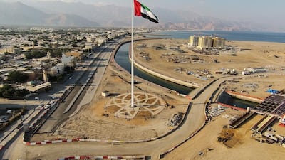 Soon every emirate will have its own giant flagpole. Courtesy of Shurooq