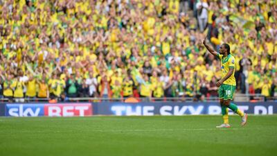 Norwich City’s English striker Cameron Jerome (R) waves as he leaves the pitch after being substituted during the English Championship play off final football match between Middlesbrough and Norwich City at Wembley Stadium in London on May 25, 2015. AFP PHOTO / GLYN KIRK