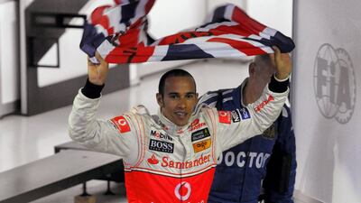 Formula One - F1 - Brazilian Grand Prix 2008 - Interlagos - 2/11/08 McLaren Mercedes' Lewis Hamilton celebrates winning the World Championship. Getty