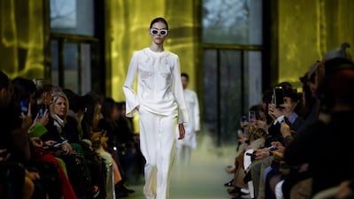 Crisp separates in white at the Elie Saab autumn/winter 2023 show. EPA