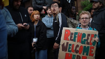 Anti-racist demonstrators gather to protect Merseyside Refugee Centre in Liverpool. Getty Images