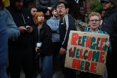 Anti-racist demonstrators gathered outside Merseyside Refugee Centre in Liverpool, one of the places that had feared far-right violence. Getty Images