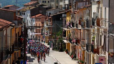Cyclists in San Bartolomeo, Italy, during the 11th stage of the 107th Giro d'Italia race. AFP)