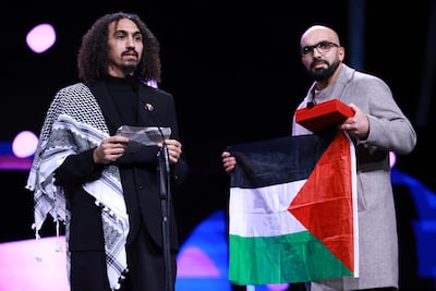 Abdallah Alkhatib and Taqiyeddine Issaad accept the GWFF Best Feature Film Debut Award for Chronicles From the Siege at the Berlin International Film Festival. EPA