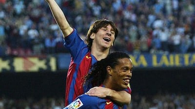 As a teenager, Messi was shy and timid but Ronaldinho made him feel welcome in his early days. Lluis Gene / AFP