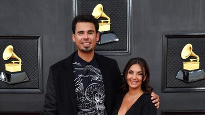 Afrojack, wearing black, with his wife, singer Elettra Lamborghini. AFP