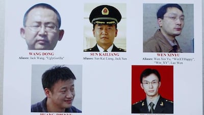 A 'wanted' poster displayed at the Justice Department in Washington on May 19, 2014, after a US jury charged five Chinese hackers with economic espionage and trade secret theft, the first-of-its-kind criminal charges against Chinese military officials in an international cyber-espionage case. AP Photo