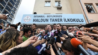 Istanbul mayoral candidate Ekrem Imamoglu of the CHP greets his supporters after casting his vote in a polling station in the re-run local mayoral elections for Istanbul on June 23, 2019 in Istanbul, Turkey. Burak Kara / Getty Images
