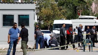 Police forensic experts examine in front of the Israeli embassy in Ankara on September 21, 2016. Umit Bektas / Reuters