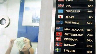 Around the world, currency valuations are a minefield for investors and have proven nearly impossible to predict. Narong Sangnak / EPA