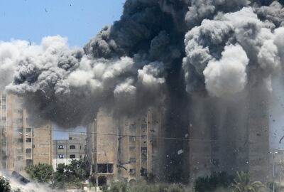 An explosion after an Israeli air strike on a residential building in Nuseirat camp. Reuters