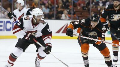 Arizona Coyotes left wing Anthony Duclair controls the puck against the Anaheim Ducks in an NHL victory on Wednesday night. Christine Cotter / AP / October 14, 2015