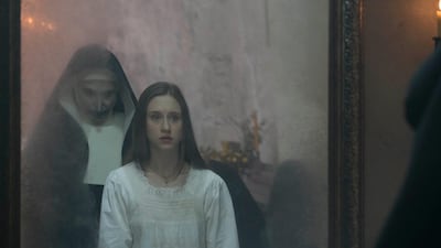 Taissa Farmiga plays Sister Irene in ‘The Nun’, alongside Bonnie Aarons, above left. Courtesy Warner Bros Pictures