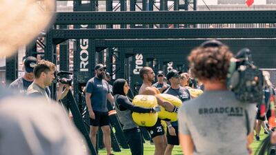 The CrossFit games include lifting weights, pull-ups, handstand walks, peg-board and rope climbs, distance swims and obstacle courses.