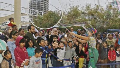 Young and old alike enjoy the Bubble Show at the Sharjah Aquarium Carnival. There are live performances, workshops, children’s play areas and interactive learning experiences at the free event. Jeffrey E Biteng / The National