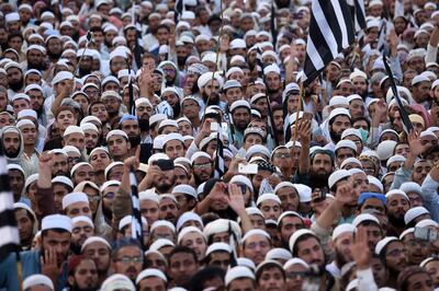 Supporters of the Pakistani religious Islamist group Mutahida Majlis-e-Amal (MMA) gather during a protest rally against the release of Asia Bibi. AFP