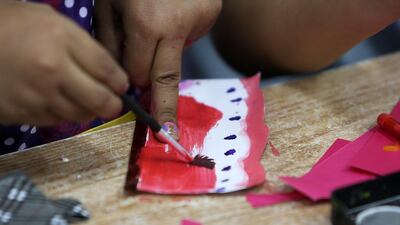 Grade 4 students at British division of Zakher Private School in Al Ain take part in a bookmark making contest.