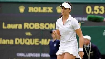 Laura Robson celebrates winning against Mariana Duque-Marino.