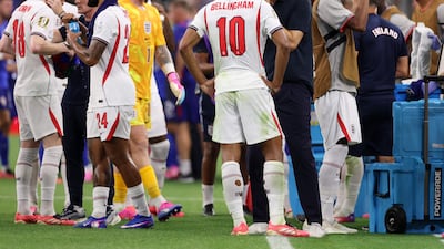 Jude Bellingham speaks to England manager Thomas Tuchel during their match against Croatia at the Dallas Stadium. AFP