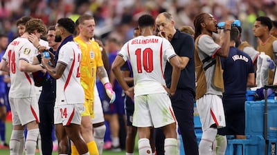 Jude Bellingham speaks to England manager Thomas Tuchel during their match against Croatia at the Dallas Stadium. AFP