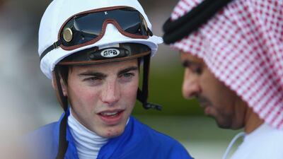 ames Doyle riding Haafaguinea talks with trainer Saeed bin Suroor prior to the Dubai Gold Cup Sponsored By Al Tayer Motors as part of the Dubai World Cup at Meydan Racecourse on March 26, 2016 in Dubai, United Arab Emirates. (Photo by Francois Nel/Getty Images)