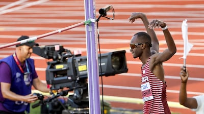 Mutaz Barshim celebrates a successful jump during the final of the men's high jump. EPA