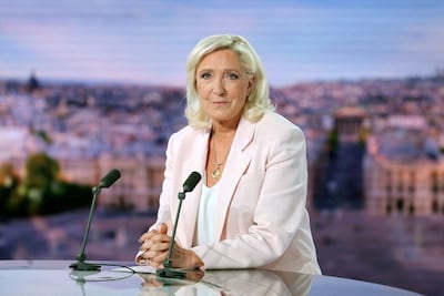 Marine Le Pen carries out a TV interview following the verdict in her appeal trial over misuse of EU funds. AFP
