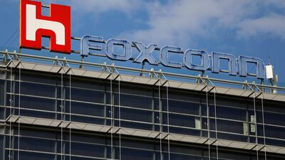 The logo of Foxconn, the trading name of Hon Hai Precision, is seen on top of the company's building in Taipei. Reuters