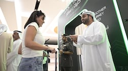 Travellers use the new Click and Travel service at Terminal 3, Dubai International Airport. Ahmed Ramzan / The National