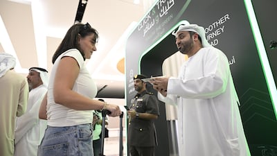 Travellers use the new Click and Travel service at Terminal 3, Dubai International Airport. Ahmed Ramzan / The National
