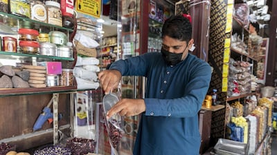 Mohammed Naseem, a spice shop keeper, says he always keeps a record of goods that he gives to the porter.