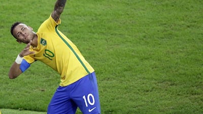 Brazil’s Neymar celebrates after scoring his team’s first goal on a free kick during the final match of the men’s Olympic football tournament between Brazil and Germany at the Maracana stadium in Rio de Janeiro, Brazil, Saturday August 20, 2016. Luca Bruno / AP Photo