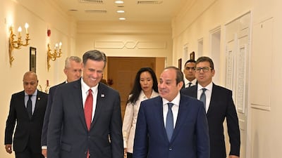 Egypt's President Abdel Fattah El Sisi chats with CIA director John Ratcliffe during a meeting in Cairo on Sunday. Photo: Egypt Presidency