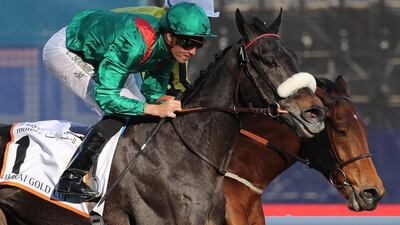 Cristophe Soumillon leads his Vazirabad before winning the Dubai Gold Cup race as part of the Dubai World Cup day horse racing event on March 26, 2016 at the Meydan racecourse in the United Arab Emirate of Dubai. Closing the UAE racing season, the Dubai World Cup day features nine races including the world’s richest horse race, the ten million US dollars Dubai World Cup. / AFP / MARWAN NAAMANI