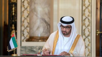 Dr Sultan Ahmed Al Jaber, UAE Minister of State, Chairman of Masdar and CEO of ADNOC Group, signs an MOU at Ras El Tin Palace. Rashed Al Mansoori / Ministry of Presidential Affairs