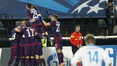 Vienna 4-1 Zenit Saint Petersburg. Despite the loss by the Russians, they advanced to the last 16 while the Austrian club earned their lone victory of group play. Heinz-Peter Bader / Reuters