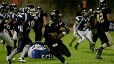 The Abu Dhabi Wildcats opened their EAFl season with victory against Al Ain Foxes. Sammy Dallal / The National