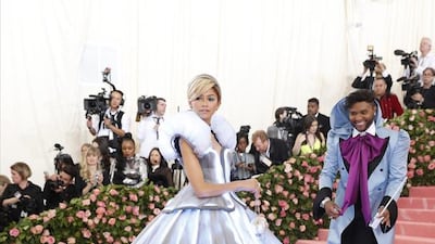 ZENDAYA, MAY 2019: While the skirt on this Cinderella gown isn't as bouffant as others in this list, the custom Tommy Hilfiger gets 'extra points' for the fact it actually lights up. Her stylist Law Roach folllowed her down the red carpet and waved a wand that wafted smoke over her as she made her way into the Met Gala. Fashion, or performance art? EPA