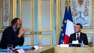French President Emmanuel Macron with former French Prime Minister Edouard Philippe at the Elysee Palace in Paris, France July 2. AP