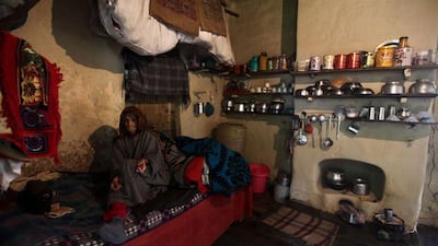 Mukti sits in her room at the hospital.