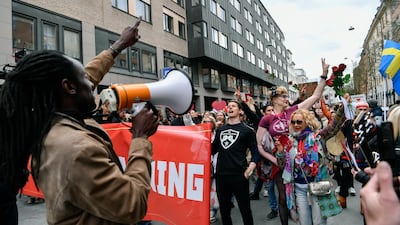 Protesters march against Covid-10 restrictions in Stockholm. AP