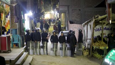 Egyptian security forces stand guard at the site where a police officer failed to defuse a bomb, near St Mary and Abu Sefein Coptic Orthodox Church in Cairo's district of Nasr City, Egypt, 06 January 2019. EPA